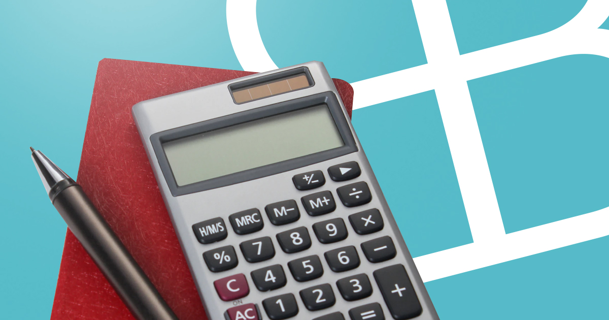 Calculator, pen and notepad to explain mortgage broker fees
