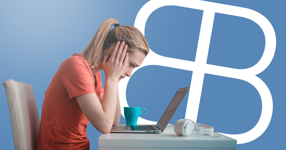 women stressed looking at computer