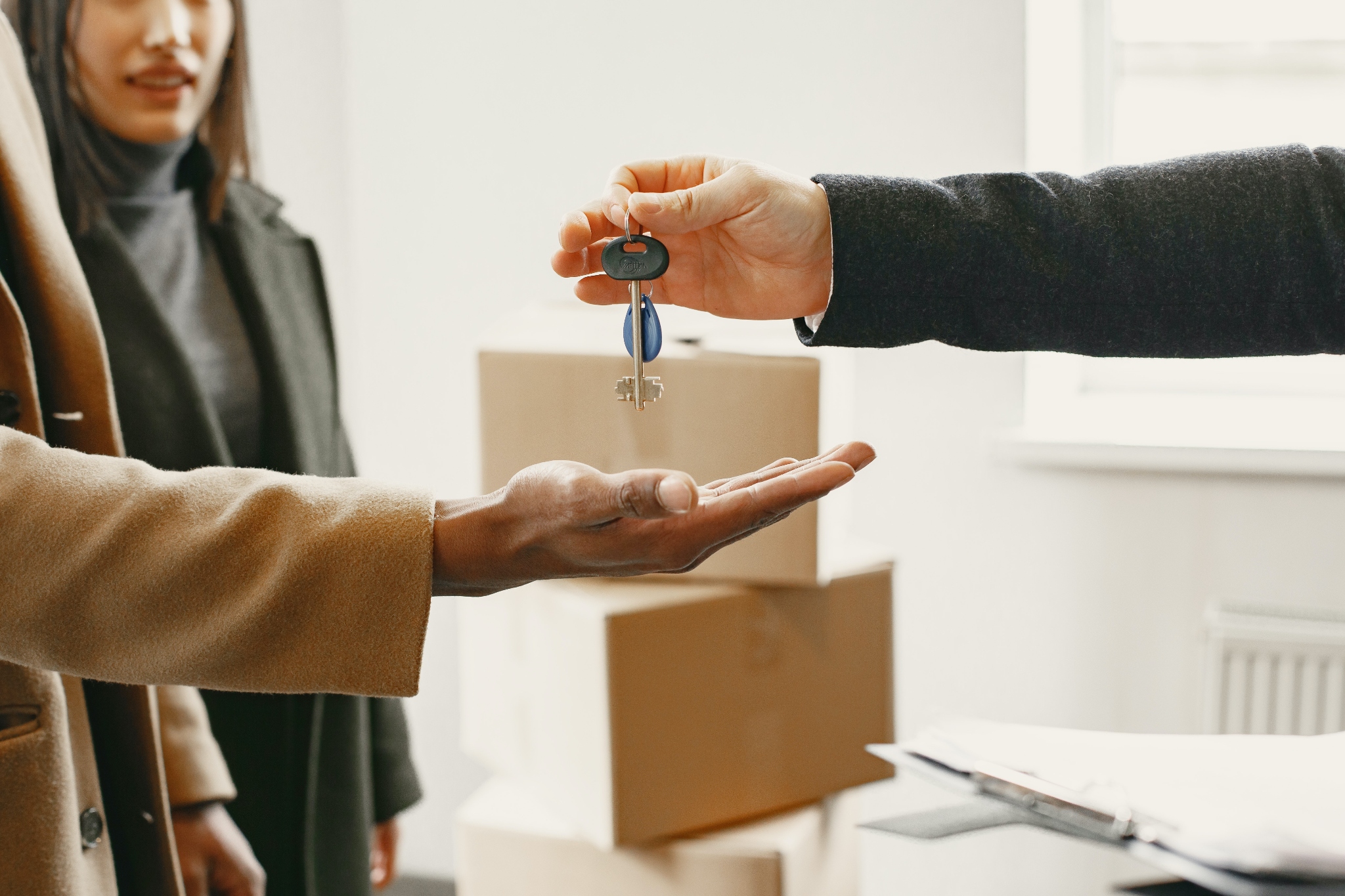 couple receiving the keys to their london house